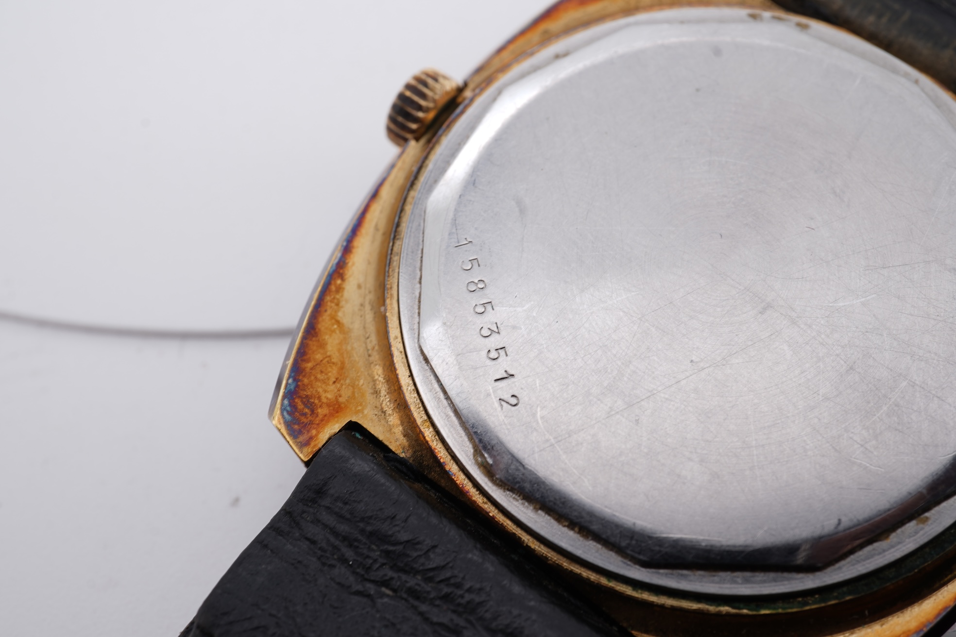 A gentleman's circa 1970's steel and gilt Longines Ultronic quartz wrist watch, with block numerals and date aperture, movement c. 6312, case diameter 40mm, on an associated leather strap, np box or papers.